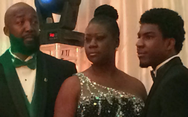 Family of Trayvon Martin, Feb. 9, 2014 in Davie, FL. From left: Tracy Martin, Sybrina Fulton and Jahvaris Fulton. (Sheryl Huggins Salomon)