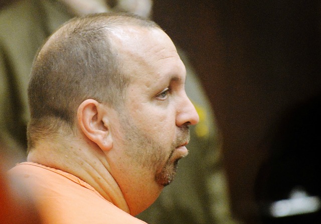 DURHAM, NC - FEBRUARY 11: Craig Stephen Hicks, 46, enters the Durham Countycourtroom for his first appearance in the shooting deaths of three University of North Carolina students in Durham, North Carolina on February 11, 2015. . Hicks has been charged with three counts of first degree murder with no bond. (Photo by Sara D. Davis/Getty Images)