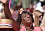 A woman prays as she attends the Sunday service outside of the Emanuel AME Church.