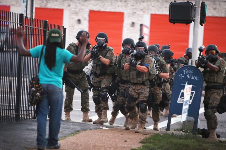 2014: An unarmed protester was approached by police during protests in Ferguson. The image became one of the most memorable of the city’s uprising.