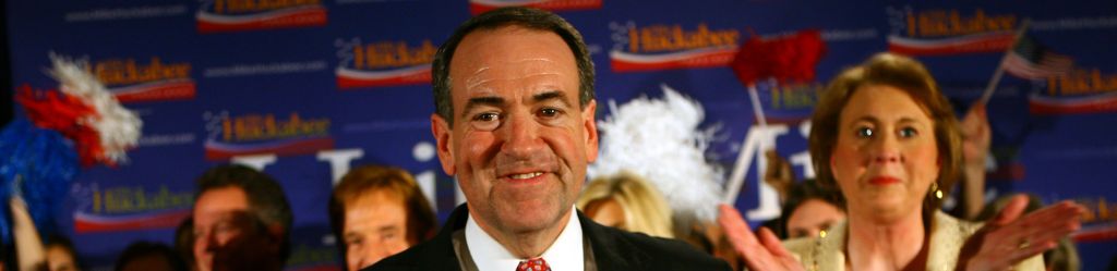 Former Arkansas Gov. Mike Huckabee with his wife, Janet, gives his acceptance speech Thursday night