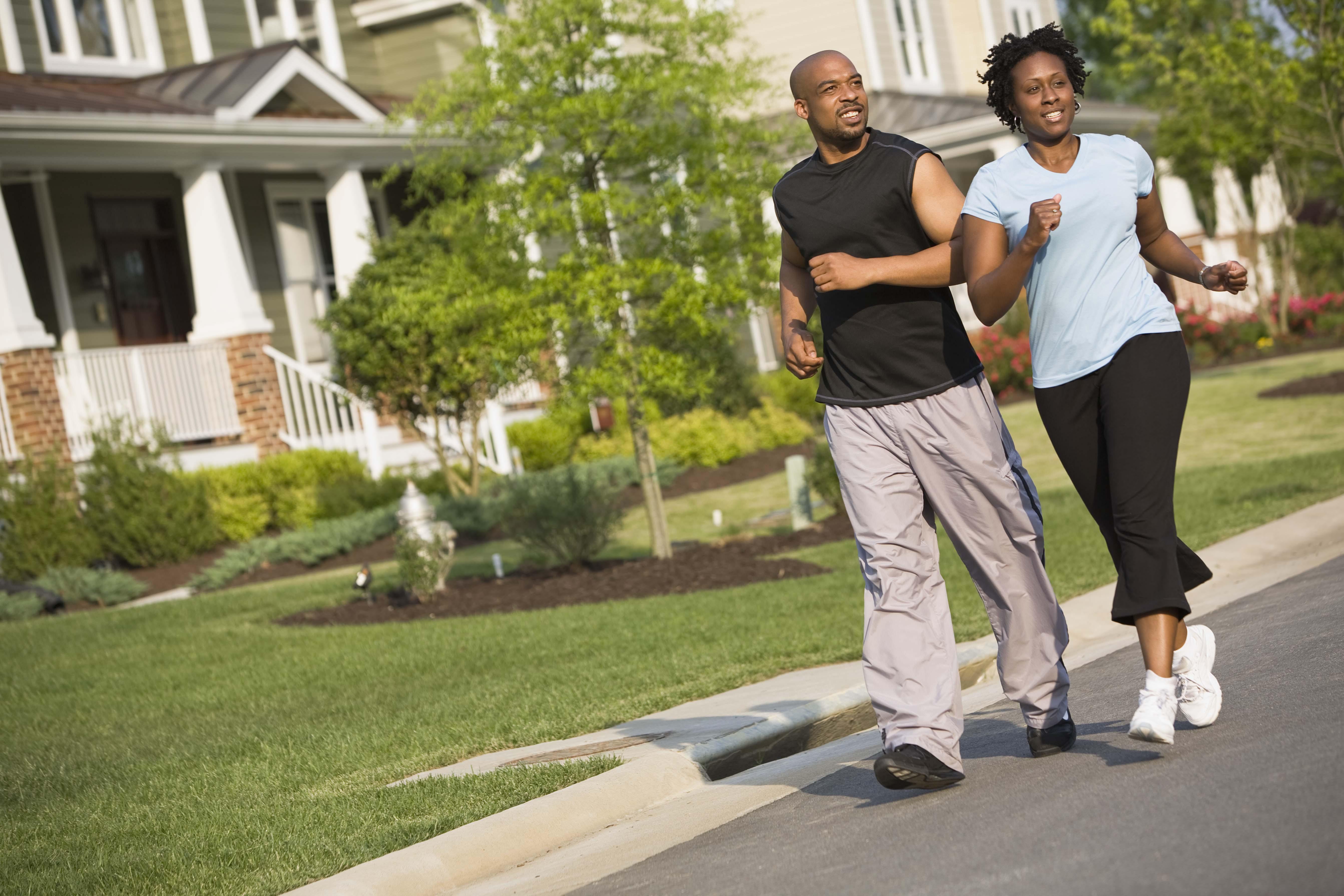 Couple running on street