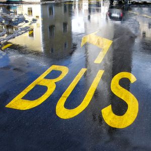 Lines on wet road, with reflection, San Candido, BZ