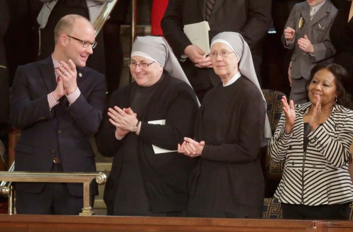 Two nuns from The Little Sisters of the Poor arrive clap for the president upon his arrival. The sisters were invited by Speaker of the House Paul Ryan (R-Wis.)