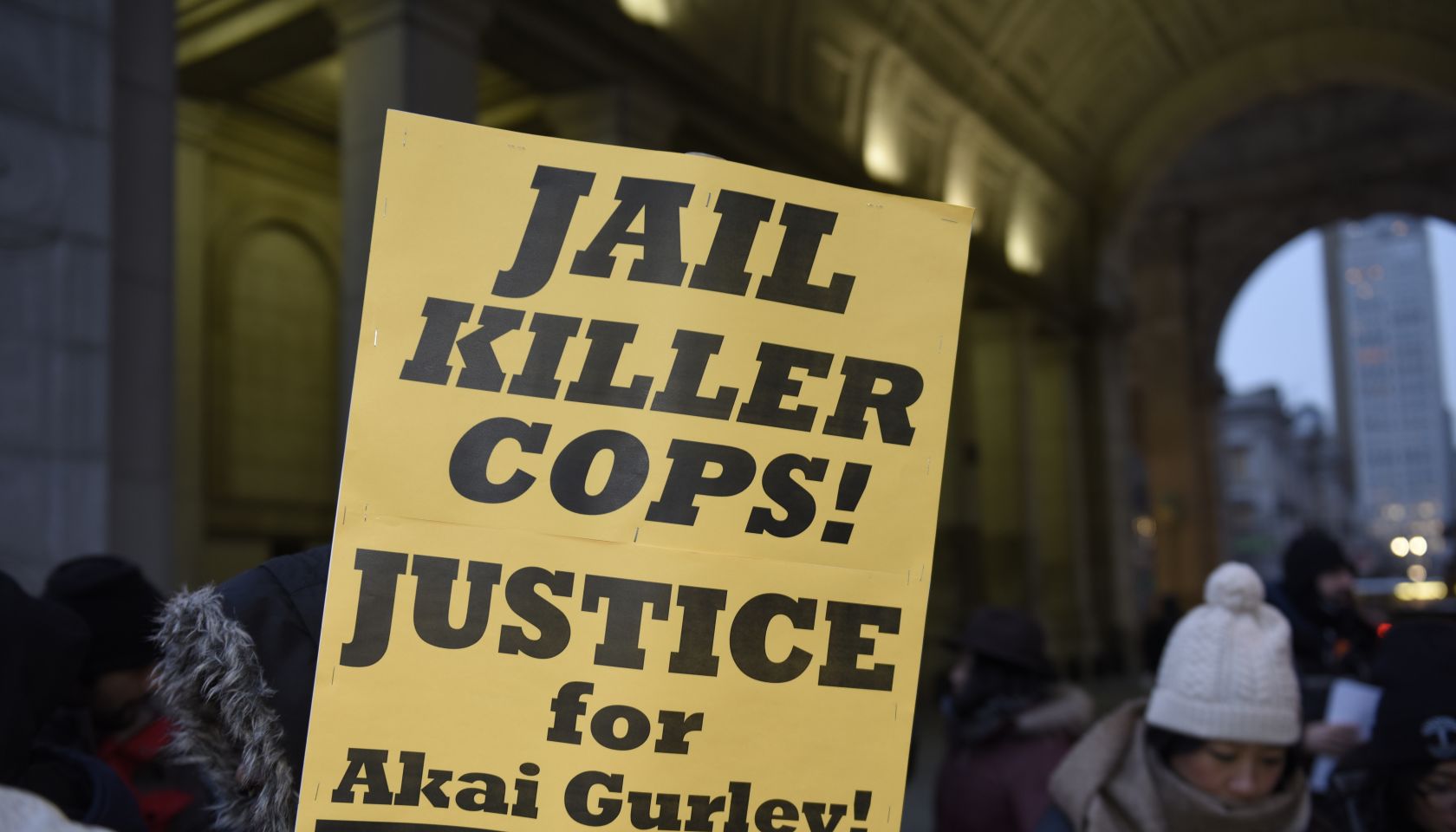 Jail Killer Cops sign at One Police Plaza. Several dozen...