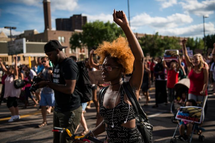 Activists Hold March Protesting Police Shooting Of Philando Castile