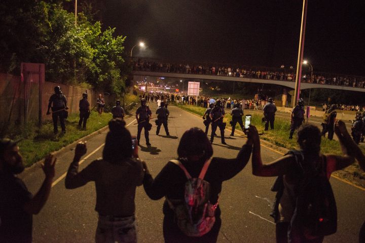 Activists Hold March Protesting Police Shooting Of Philando Castile