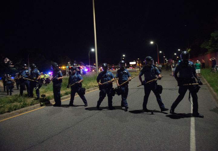 Activists Hold March Protesting Police Shooting Of Philando Castile