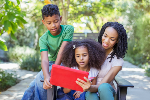 Family Reading Outside