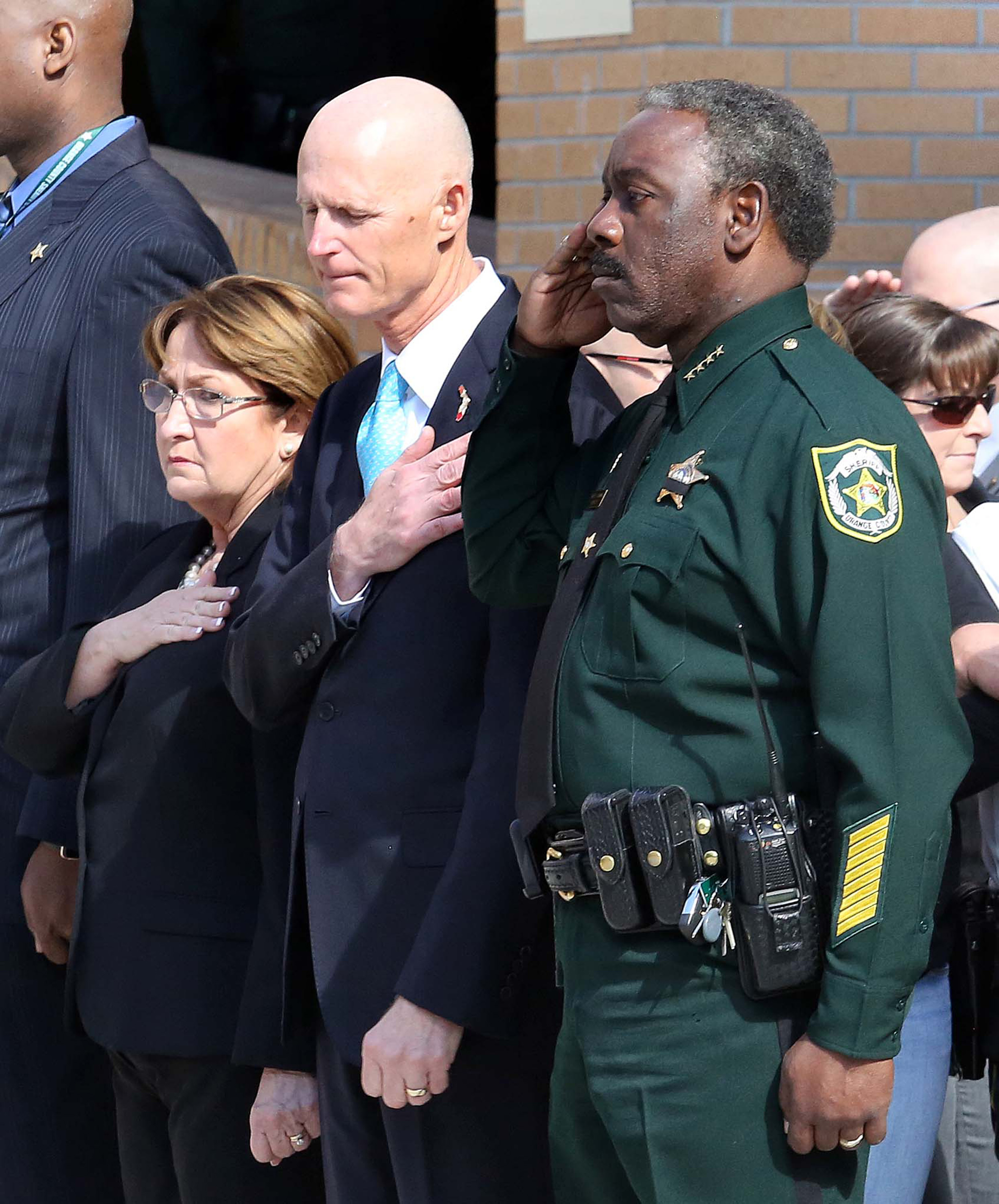 Orlando police officer shot and killed; deputy dies in crash during manunt for suspect