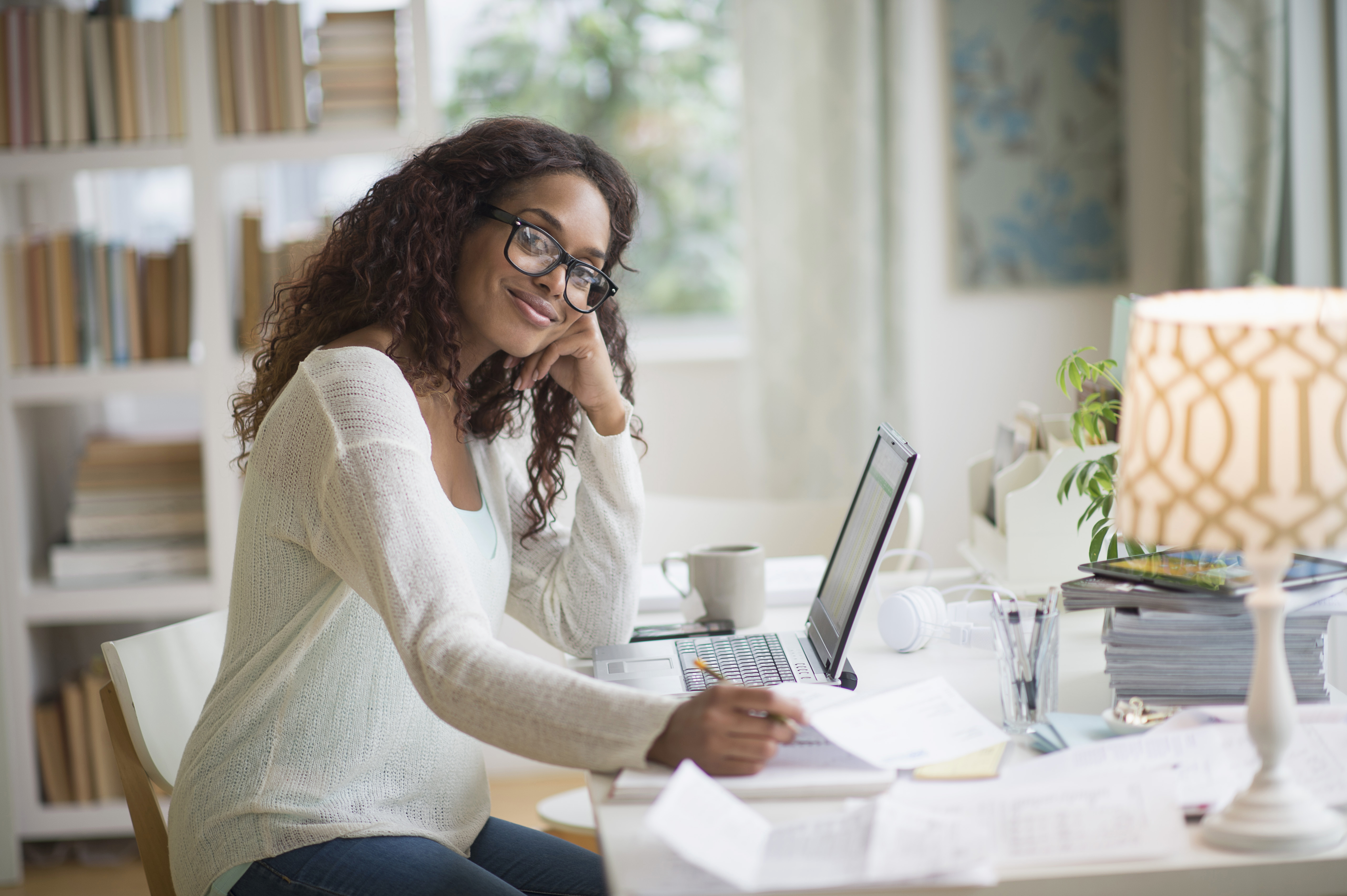 USA, New Jersey, Jersey City, Woman using laptop in home office