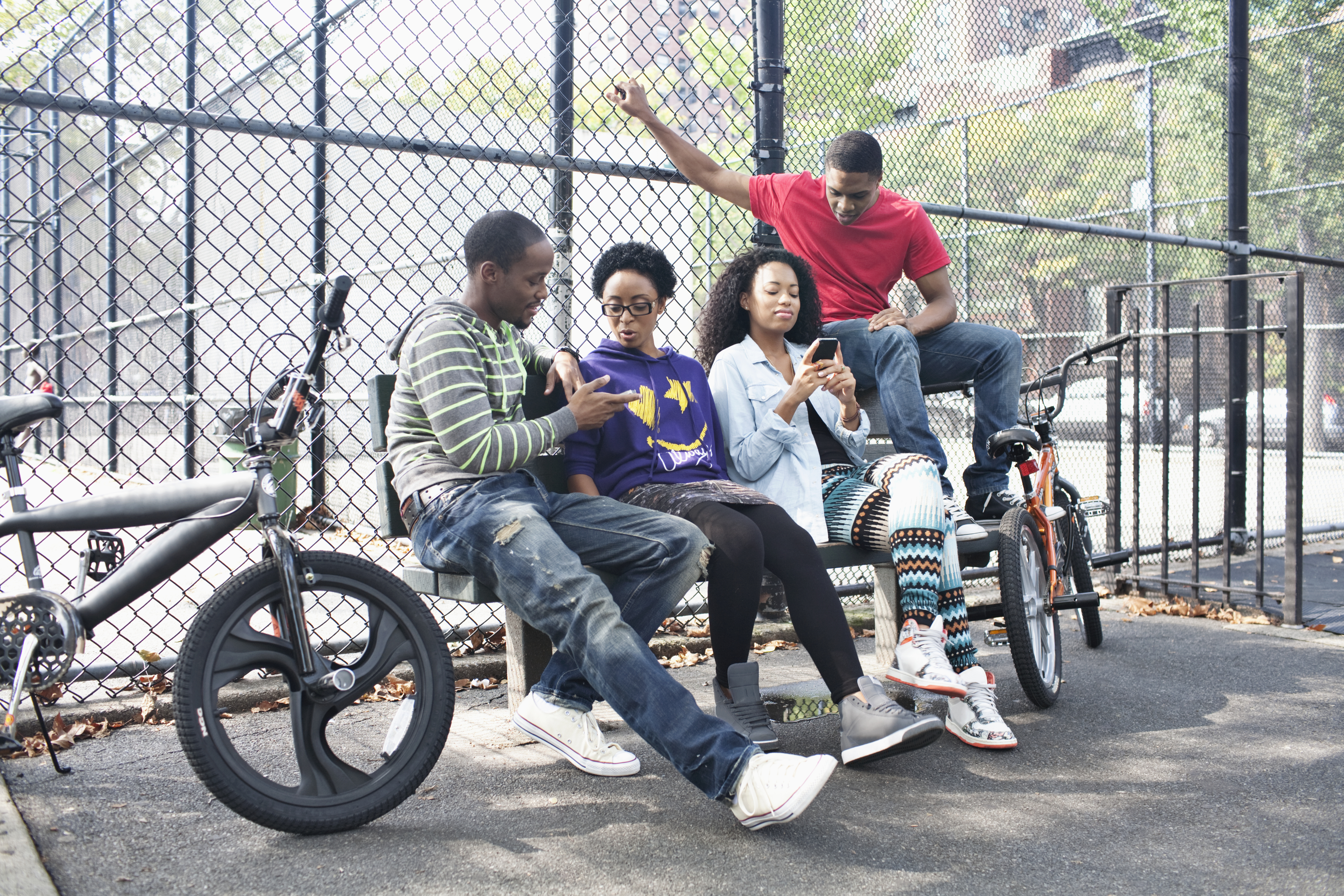 Group of friends relaxing in schoolyard
