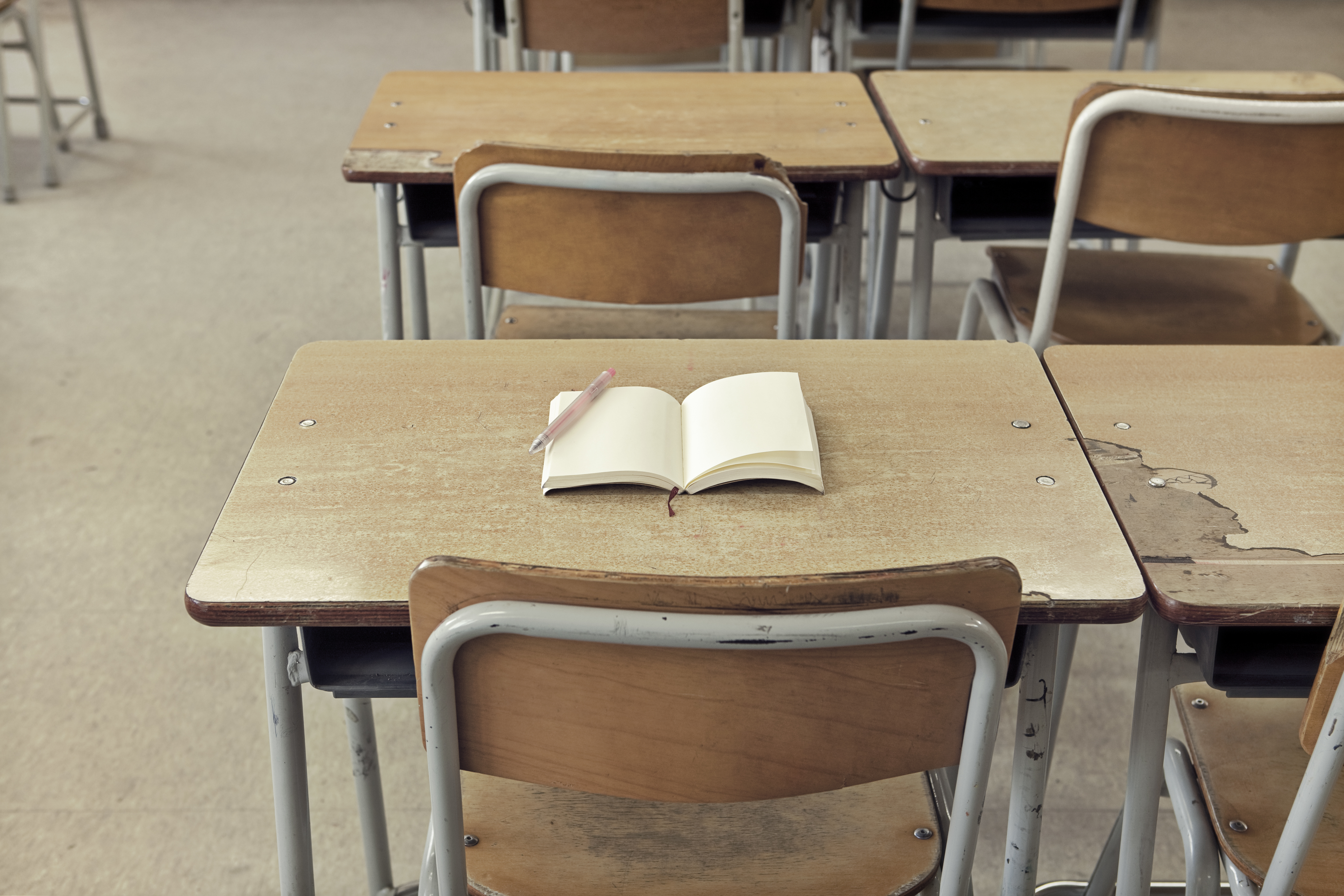 Book on desk in Classroom