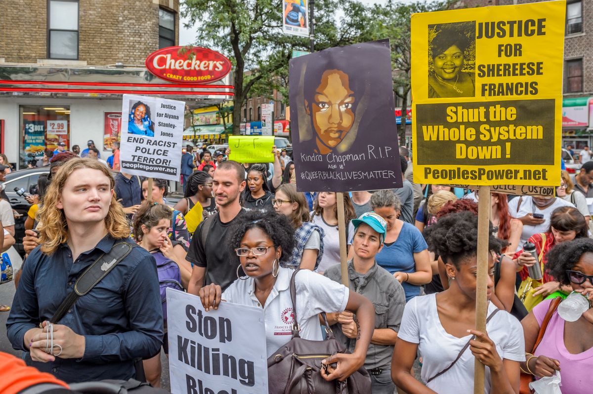 About a thousand Black Lives Matter activists rally at the...