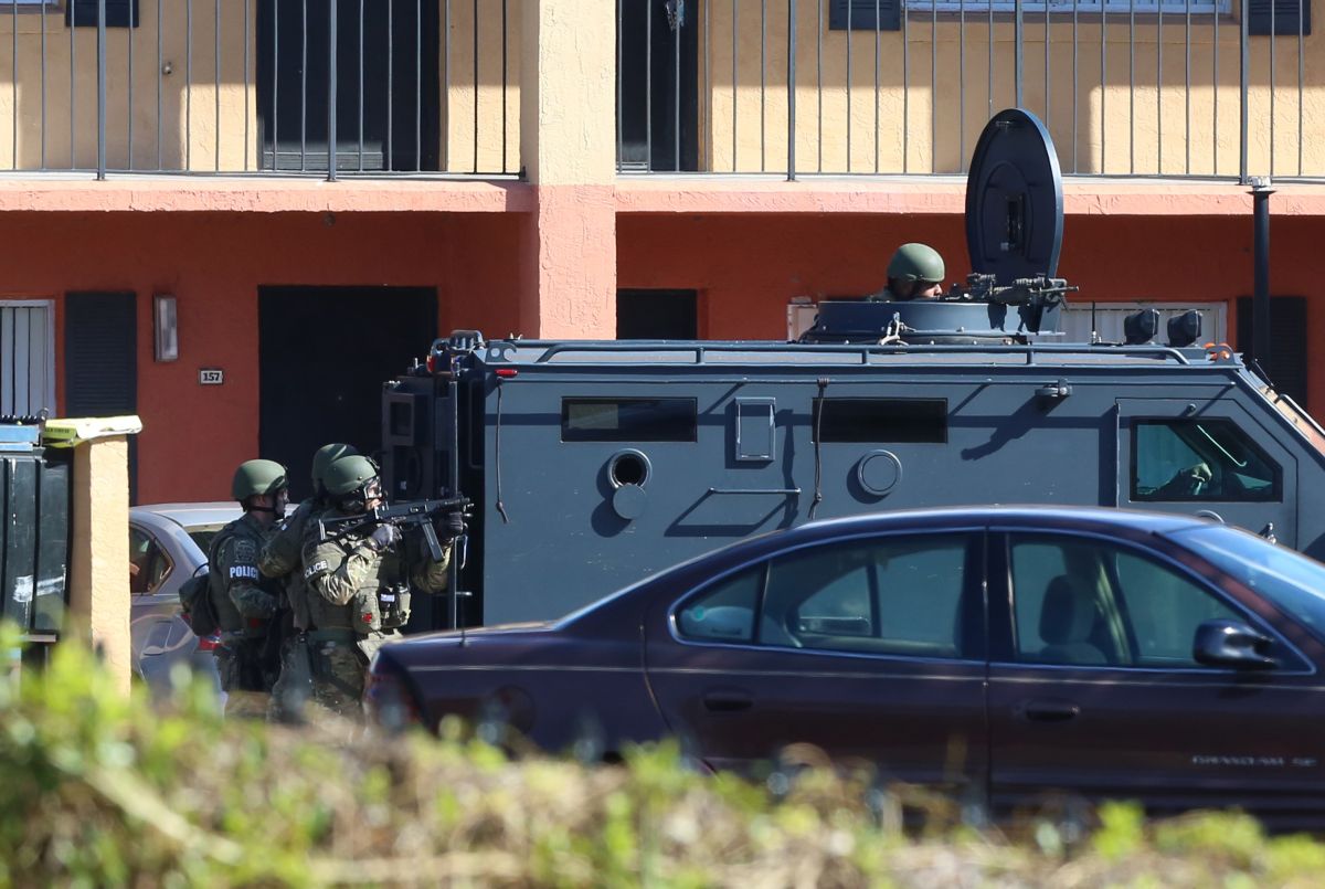 Orlando police officer shot and killed; deputy dies in crash during manunt for suspect