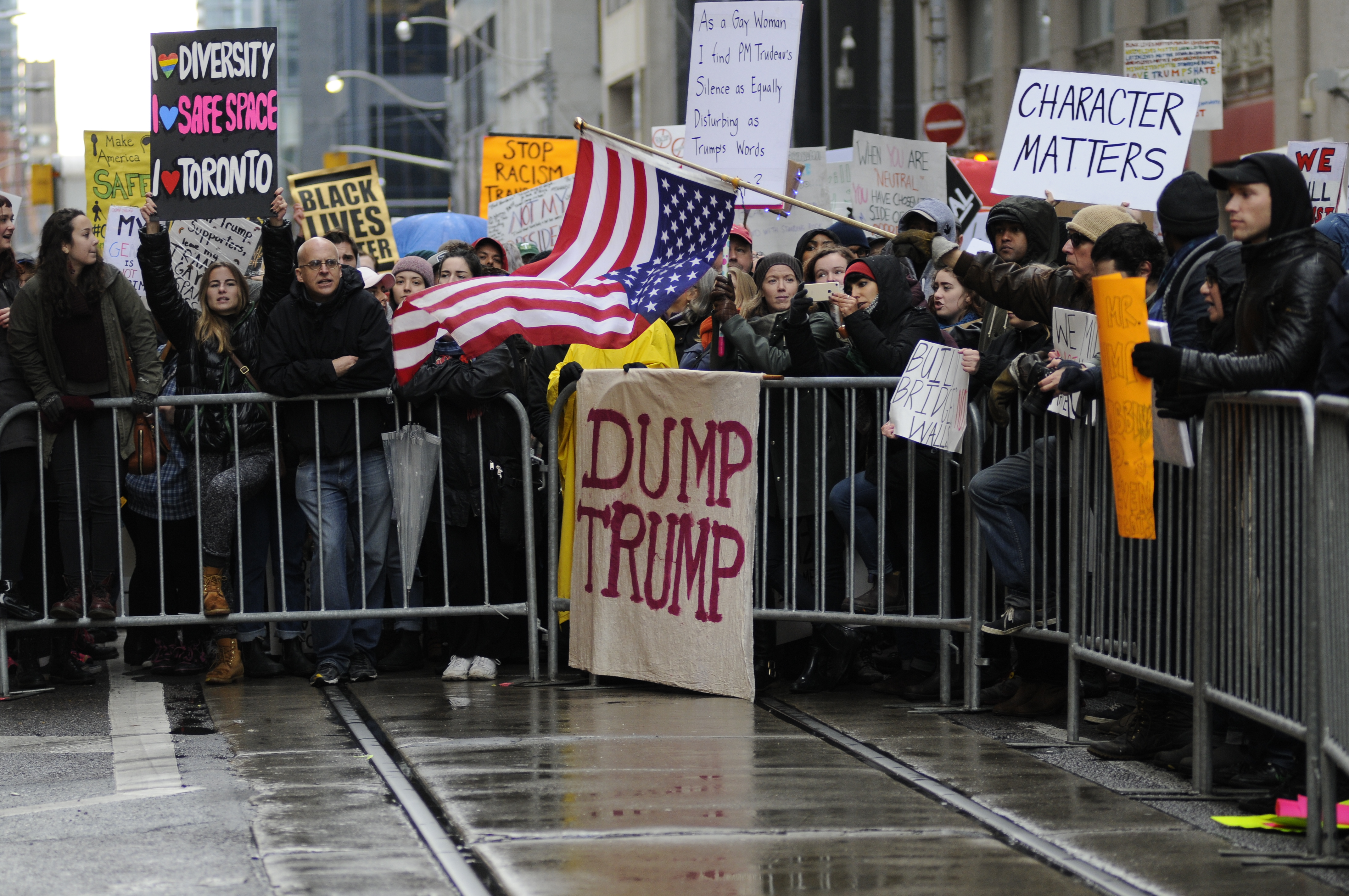 Anti-Trump Protestors Rally In Toronto