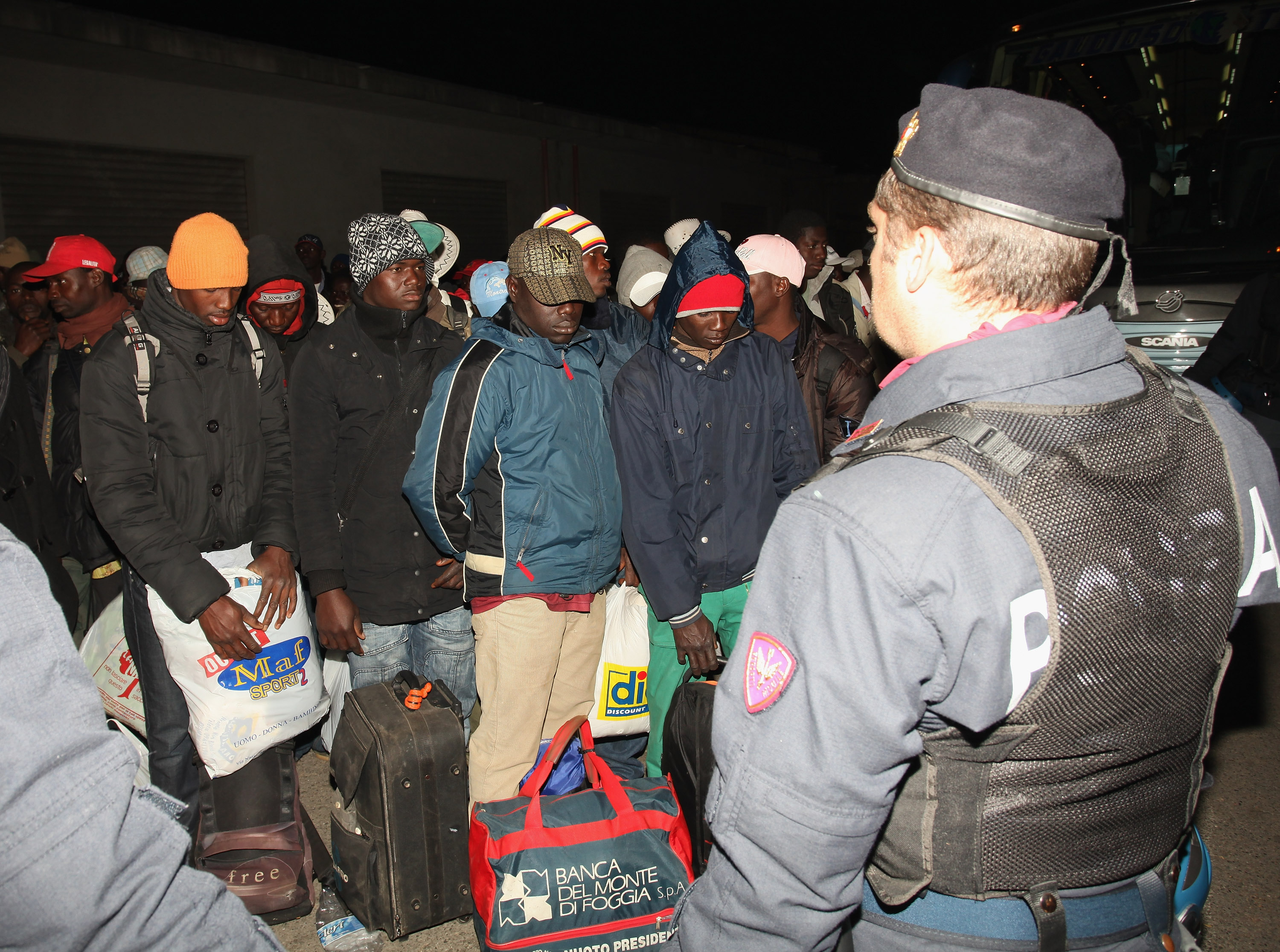 Immigrant Workers And Residents Demonstrate After Four Africans Are Wounded