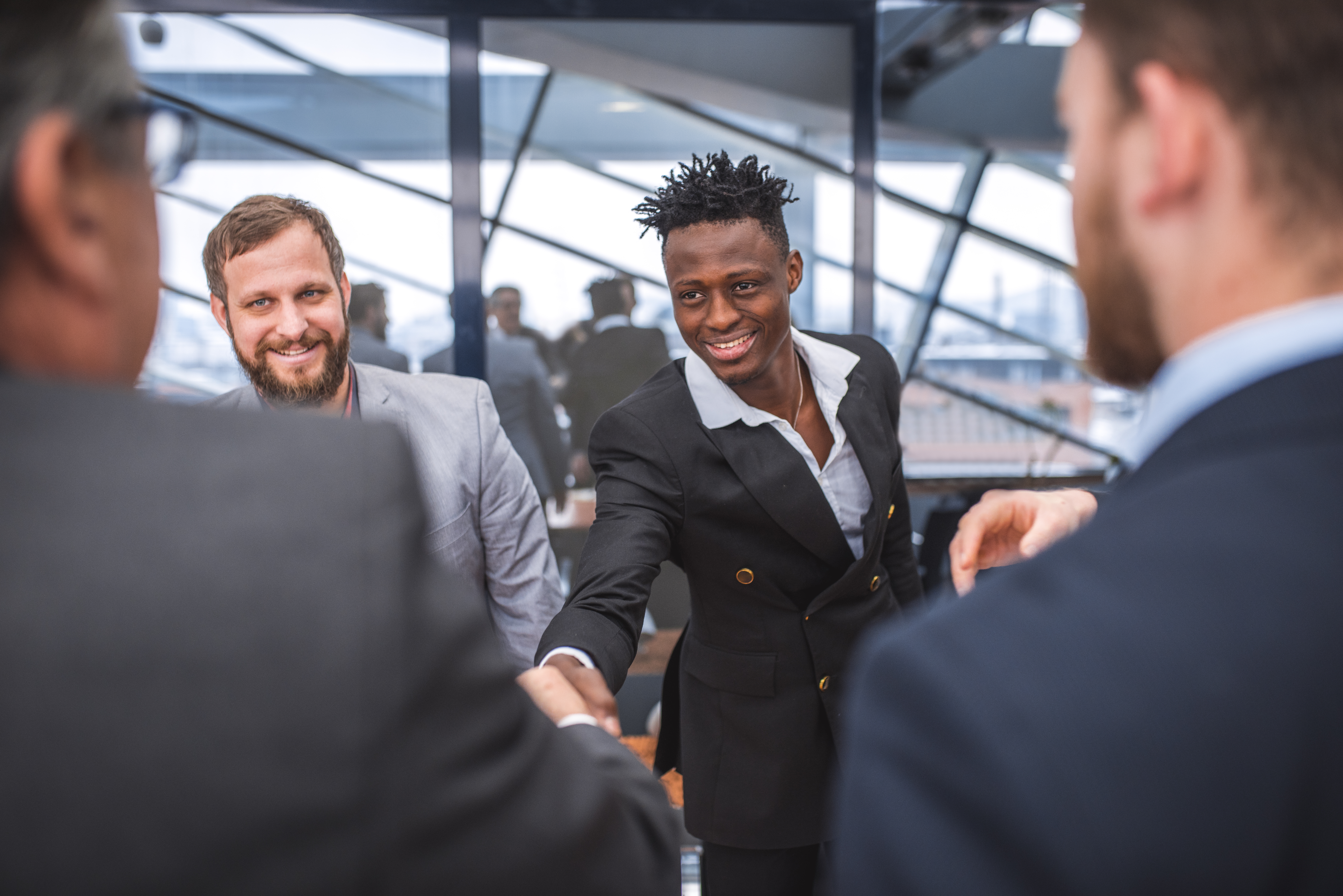 Businessmen shaking hands after meeting