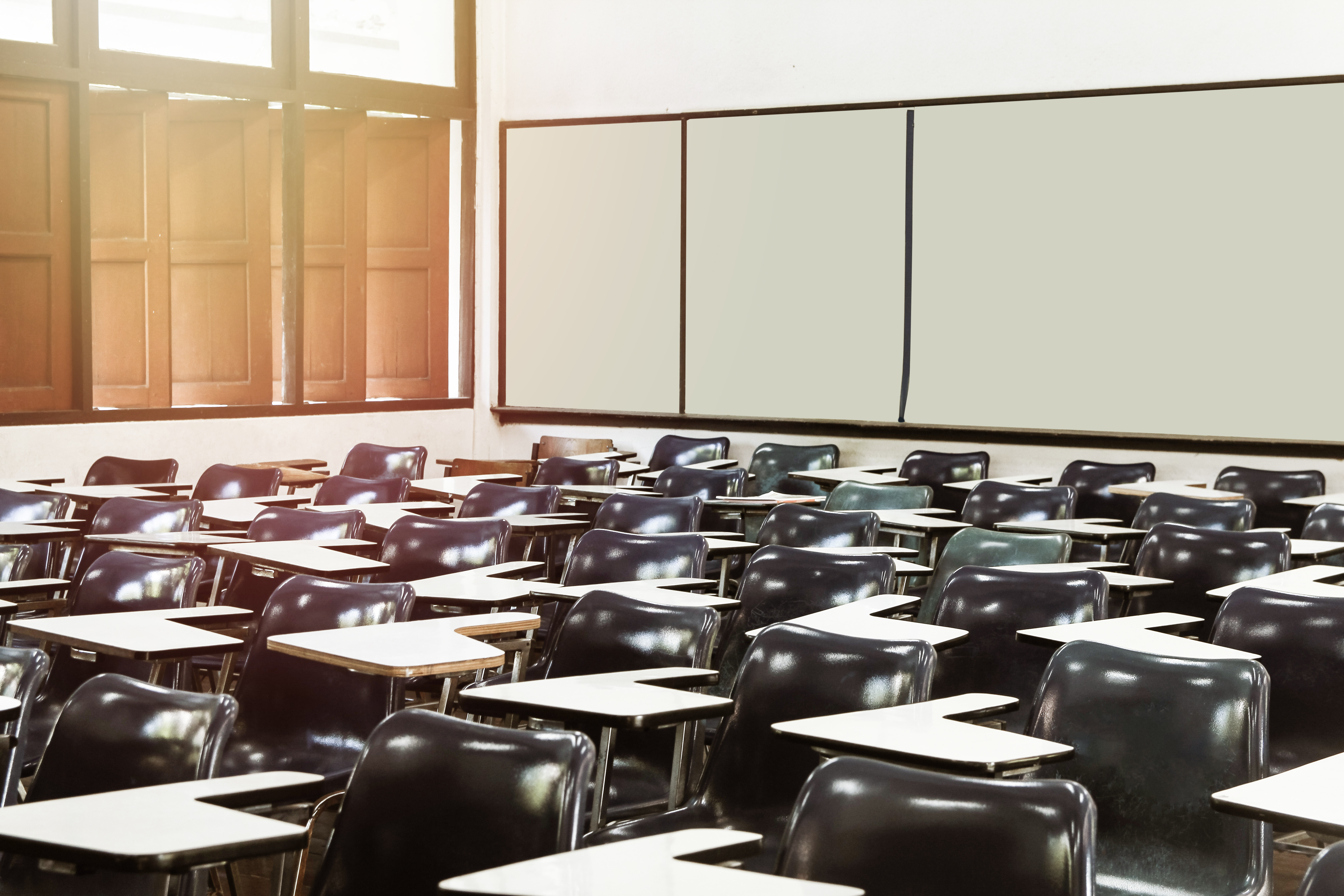 Empty Chairs In Classroom