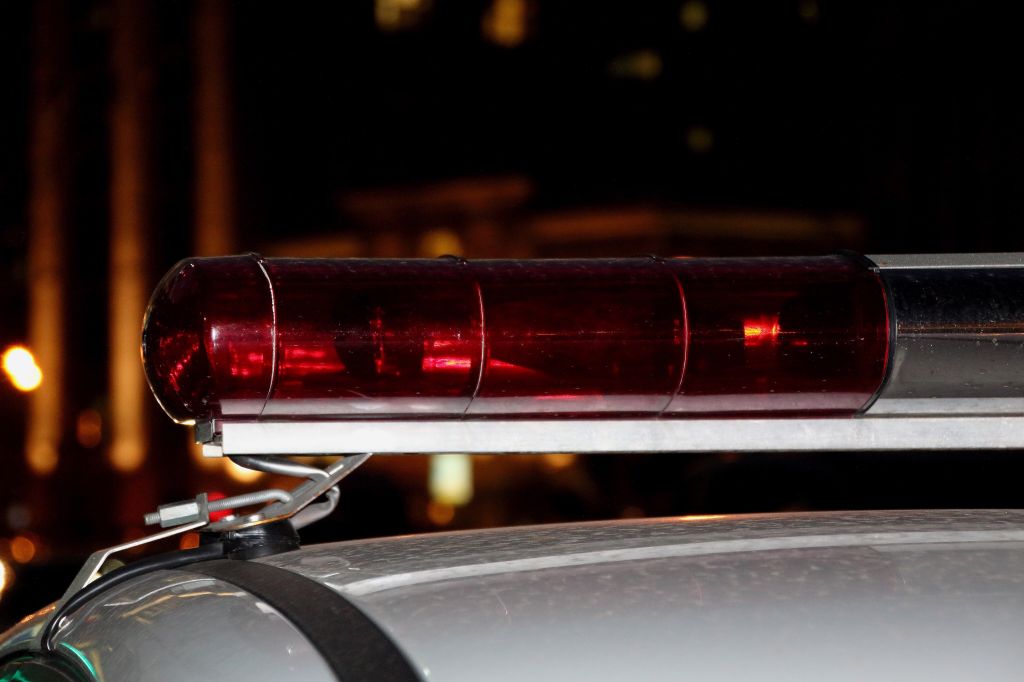 Close-Up Of Illuminated Siren On Car At Night