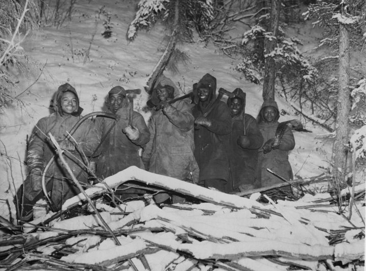 African American Soldiers Cutting Wood During World War II