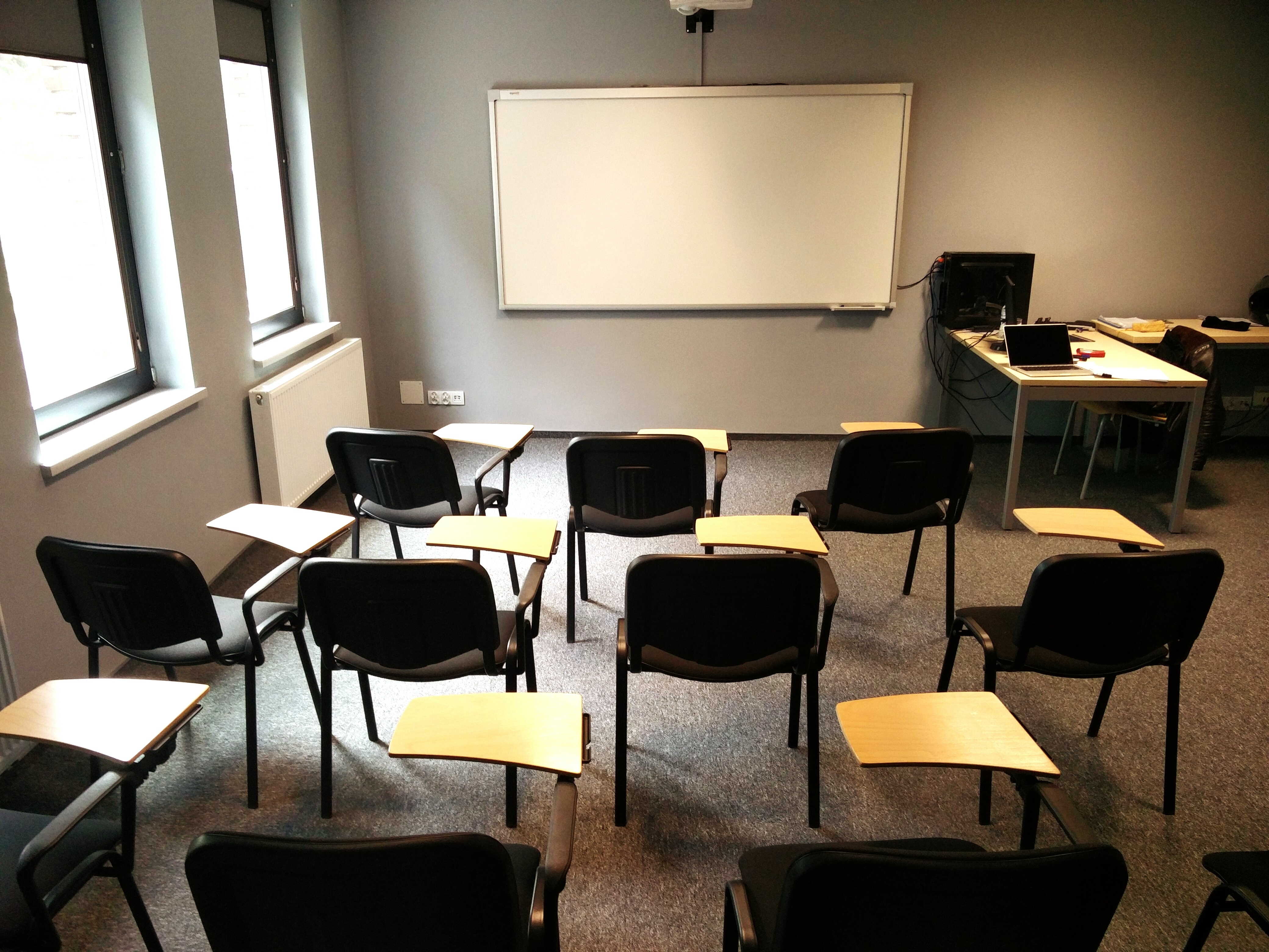 Empty Chairs In Classroom