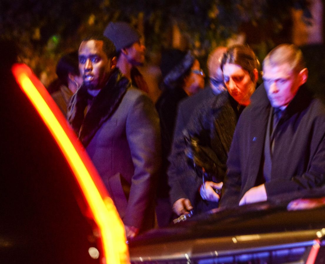 Tragic Kim Porter's two sons and former beau Diddy leave her emotional wake in Georgia.