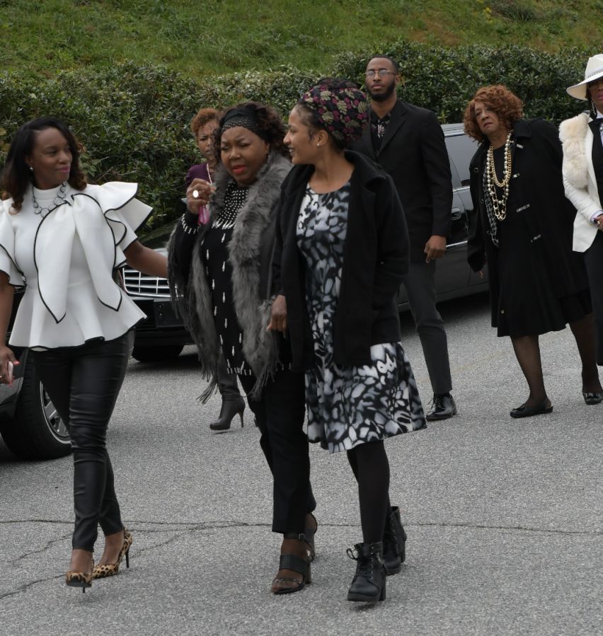 Mourners including Tichina Arnold arrive at the funeral service for Kim Porter at the Cascade Hills Church in Columbus, Georgia