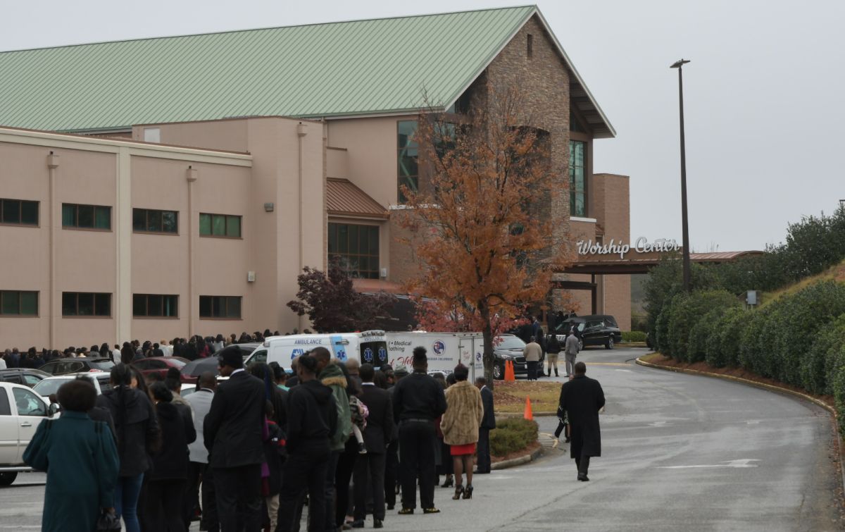 Mourners including Tichina Arnold arrive at the funeral service for Kim Porter at the Cascade Hills Church in Columbus, Georgia