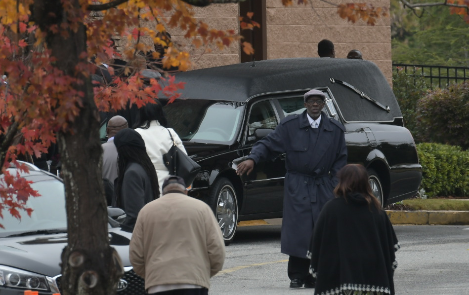 Mourners including Tichina Arnold arrive at the funeral service for Kim Porter at the Cascade Hills Church in Columbus, Georgia