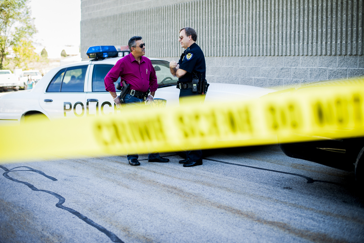 Police Detectives at Crime Scene