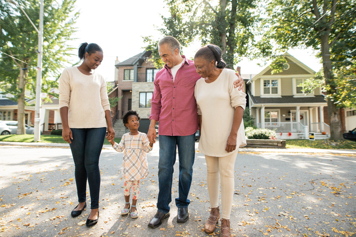 Grandparents, parent and granddaughter together