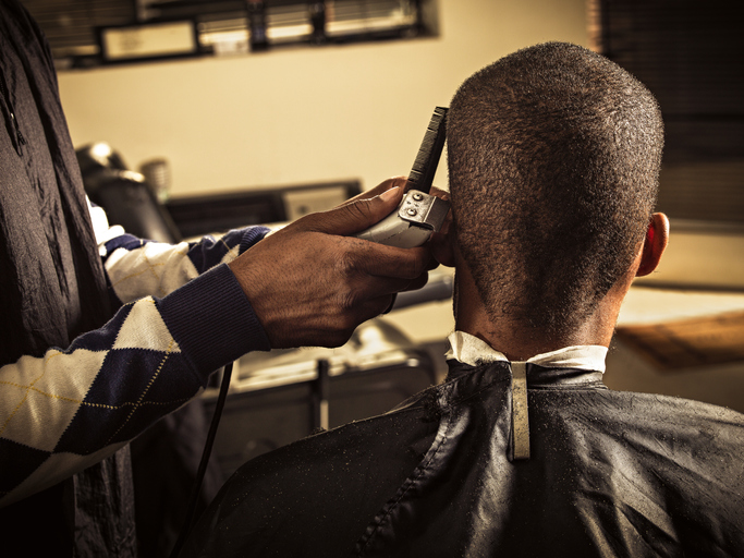 Man having haircut at barber shop