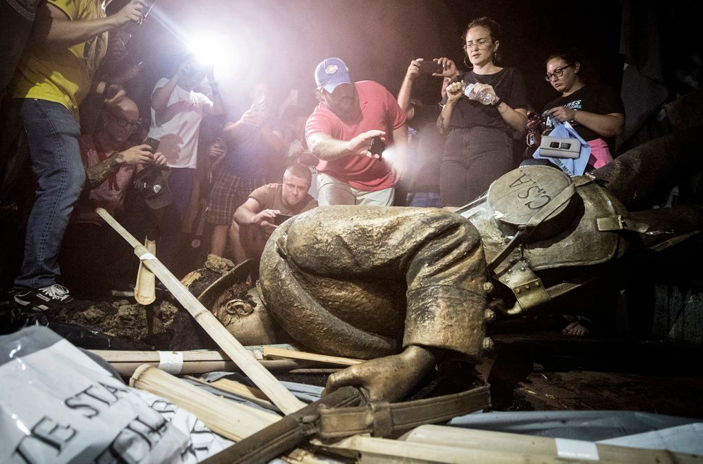 Interim UNC system president says Silent Sam should not return to its original spot