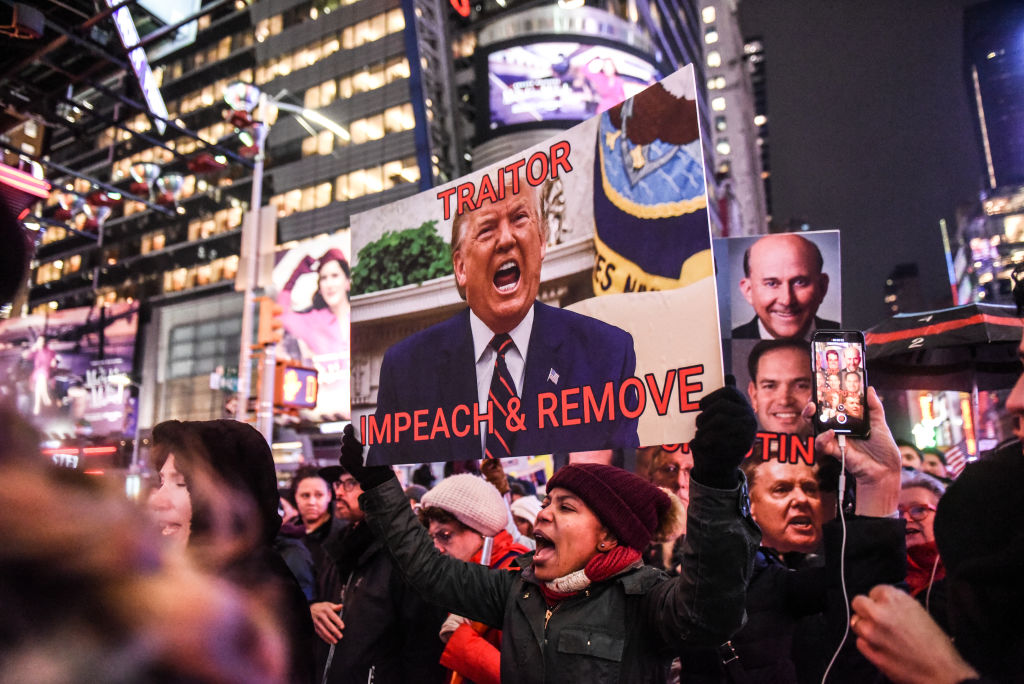 Rallies Across The Country Urging Congress To Impeach President Trump Held On Eve Of House Vote