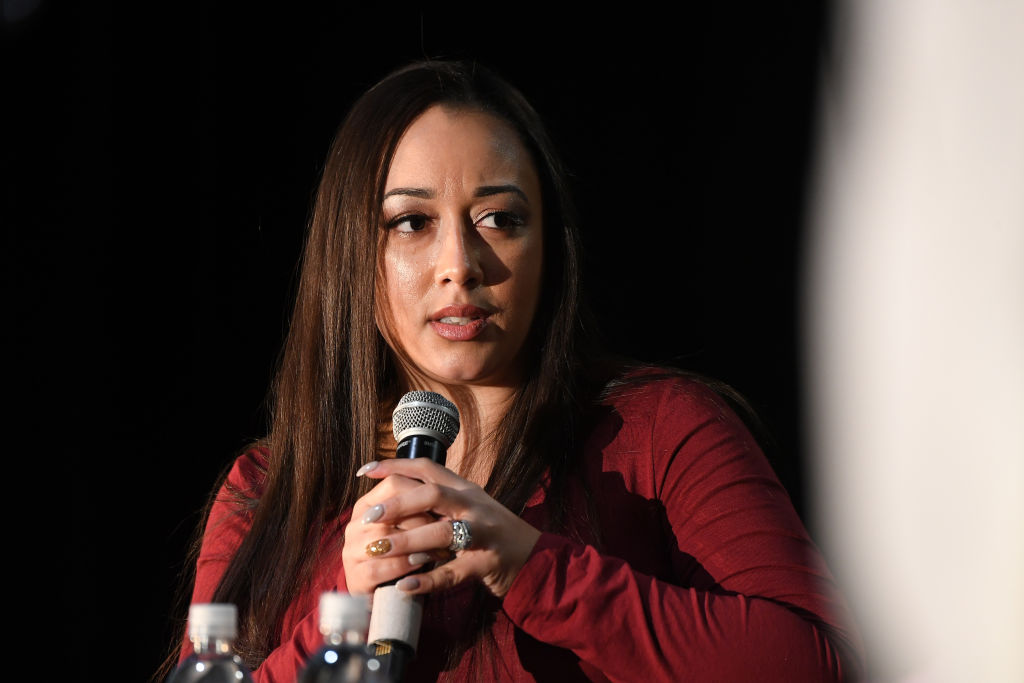 Cyntoia Brown Long Signs Copies Of "Free Cyntoia"