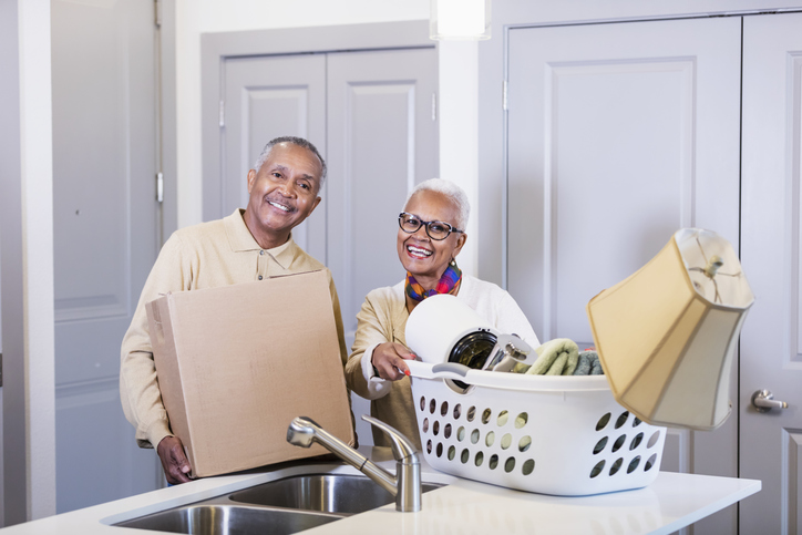 Senior African-American couple moving house