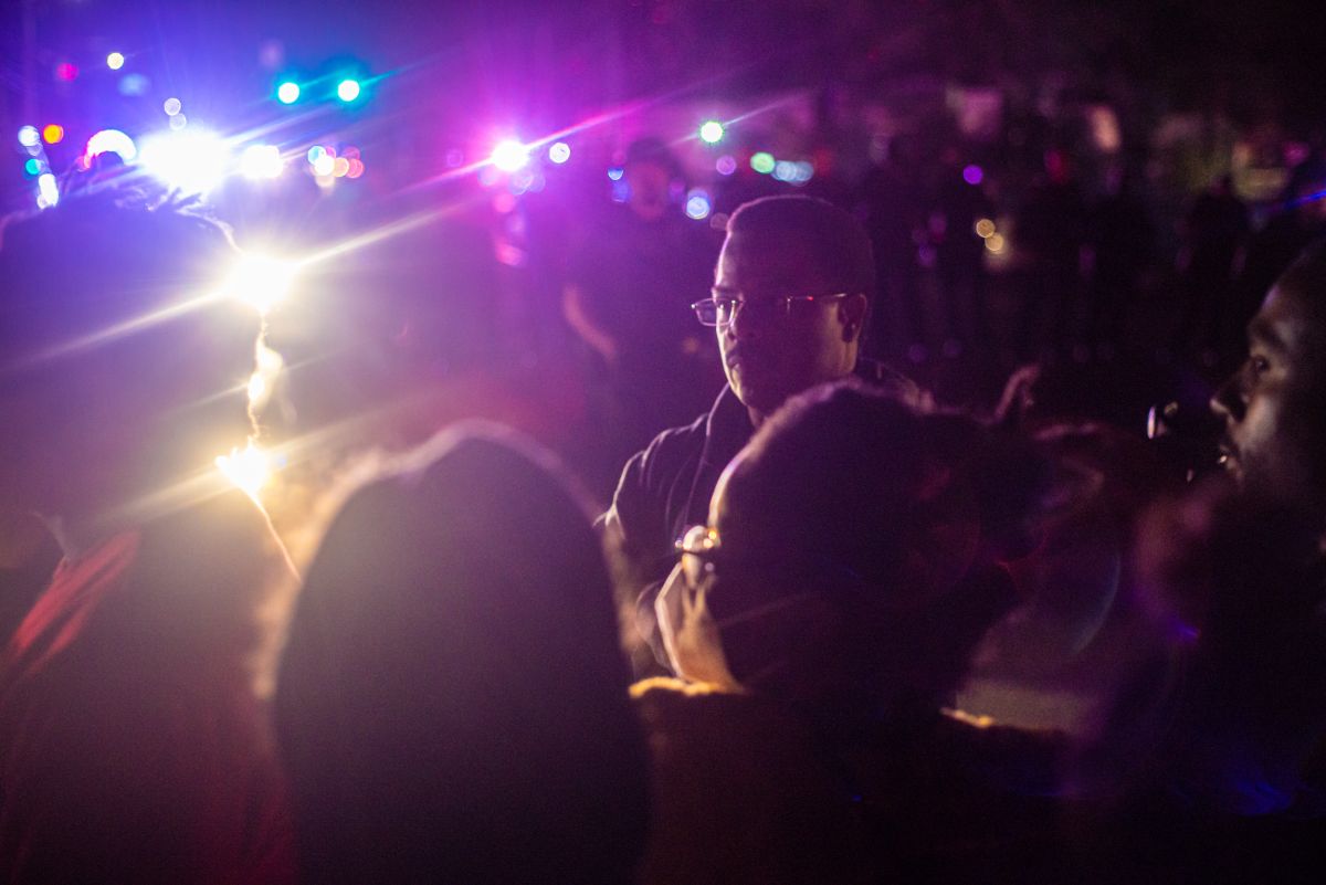 Protesters gather for Sean Reed