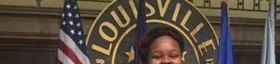 Breonna Taylor Smiles In Front Of Louisville state department