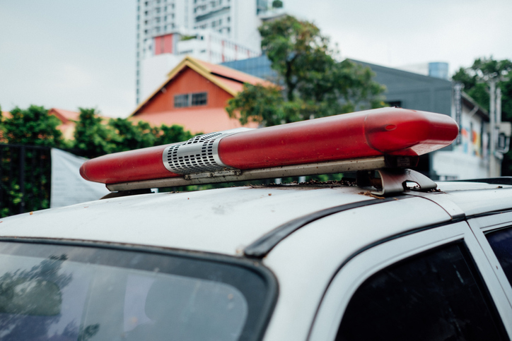 Close-Up Of Police Car Siren Against Building In City