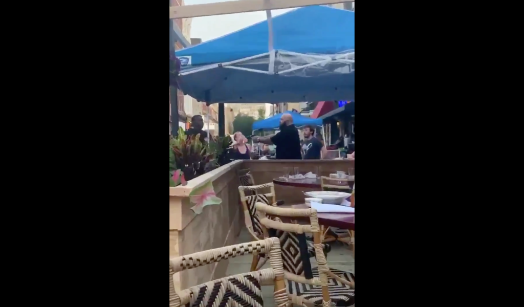 Philly bar owner pulling gun on Black man