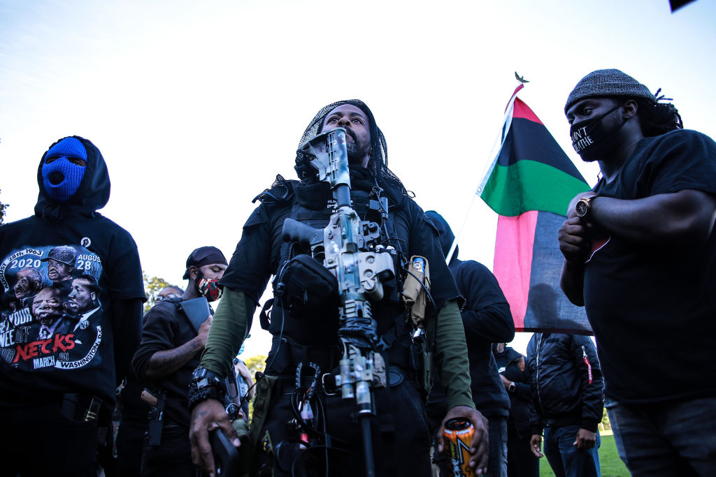 Members of the Black Rider Liberation Party are seen wearing...