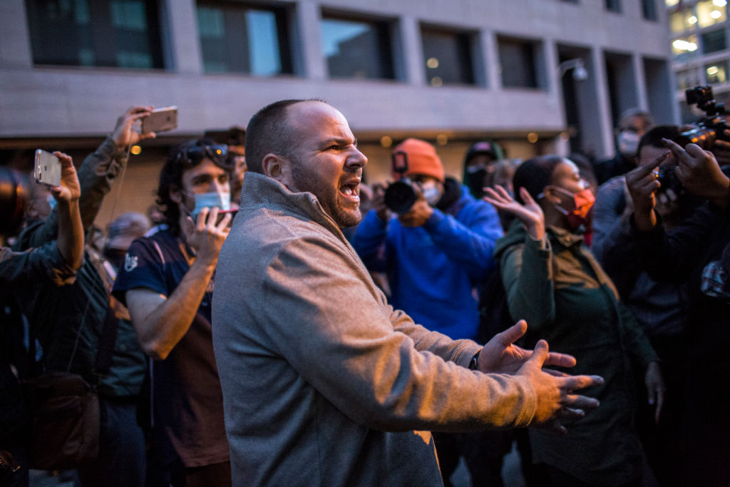 A supporter of Donald Trump is attacked by anti-Trump...