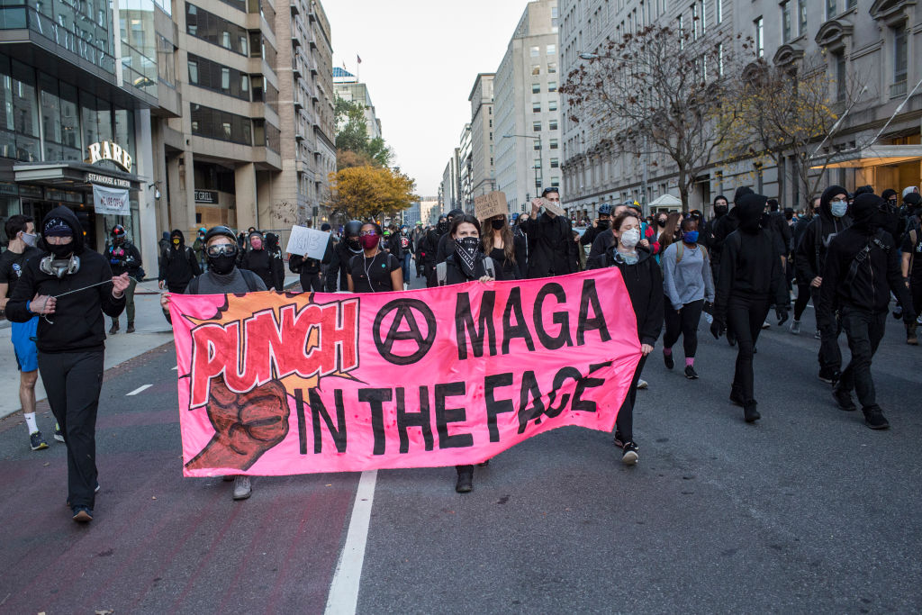 Anti-Trump demonstrators march to Black Lives Matter plaza...