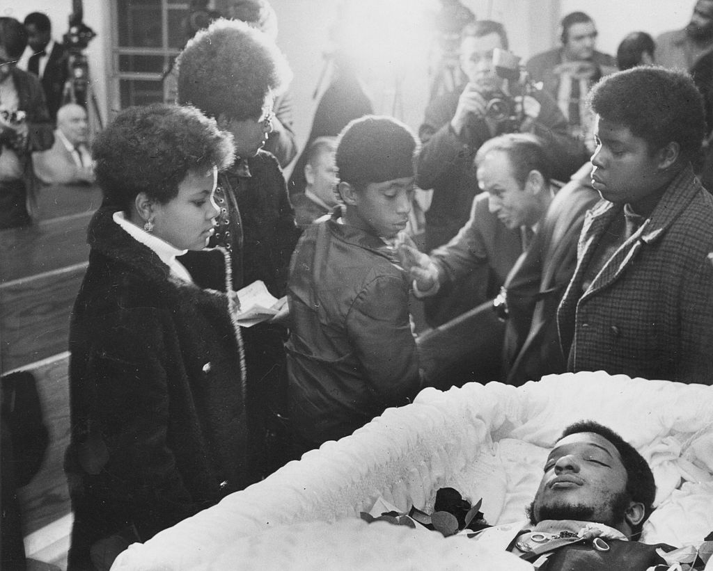Mourners At Hampton's Funeral