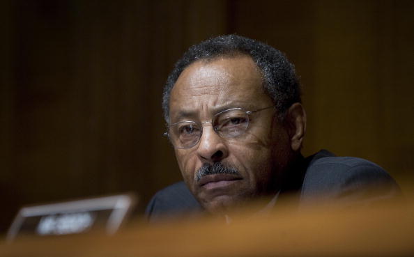 US Senator Roland Burris, D-Il, listens