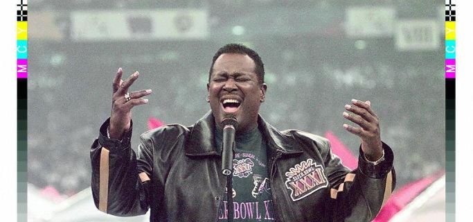 Singer Luther Vandross sings the US National Anthe