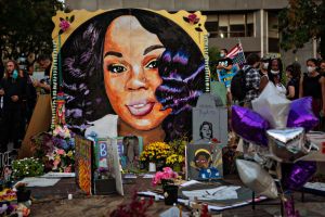 People protest a Kentucky grand jurys indictment of one of three police officers in the killing of Breonna Taylor, but not for her death