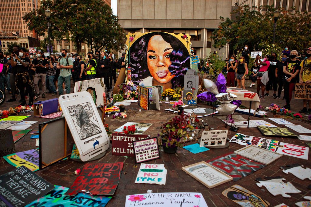 People protest a Kentucky grand jurys indictment of one of three police officers in the killing of Breonna Taylor, but not for her death