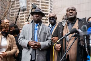 Rev. Al Sharpton & Attorney Ben Crump along with others lead the family of George Floyd and Daunte Wrigh in prayer outside of the courthouse during closing arguments in the Chauvin trial